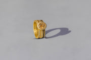 Todd Reed bands with white brilliant cut diamonds and black brilliant cut diamonds